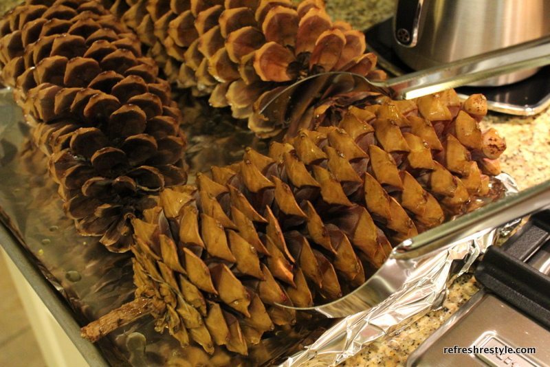 Remove the pinecones from the oven using tongues or gloves