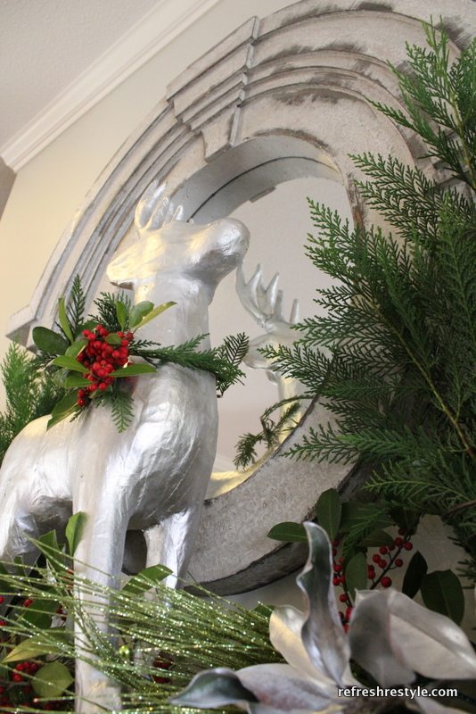 Christmas Mantel with silver and natural elements.