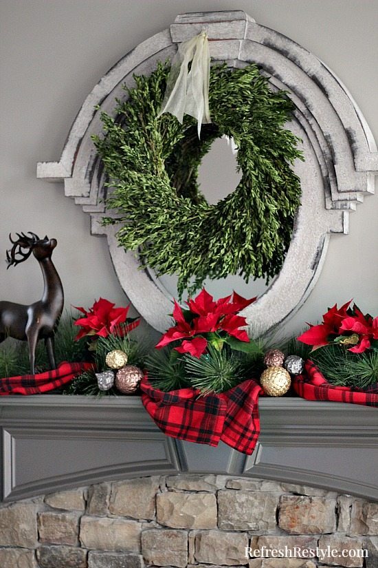 Christmas Mantel with boxwood wreath at refreshrestyle.com