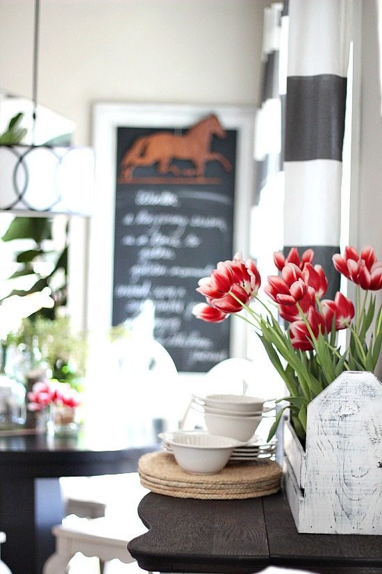 Spring tulips in frugal decor.