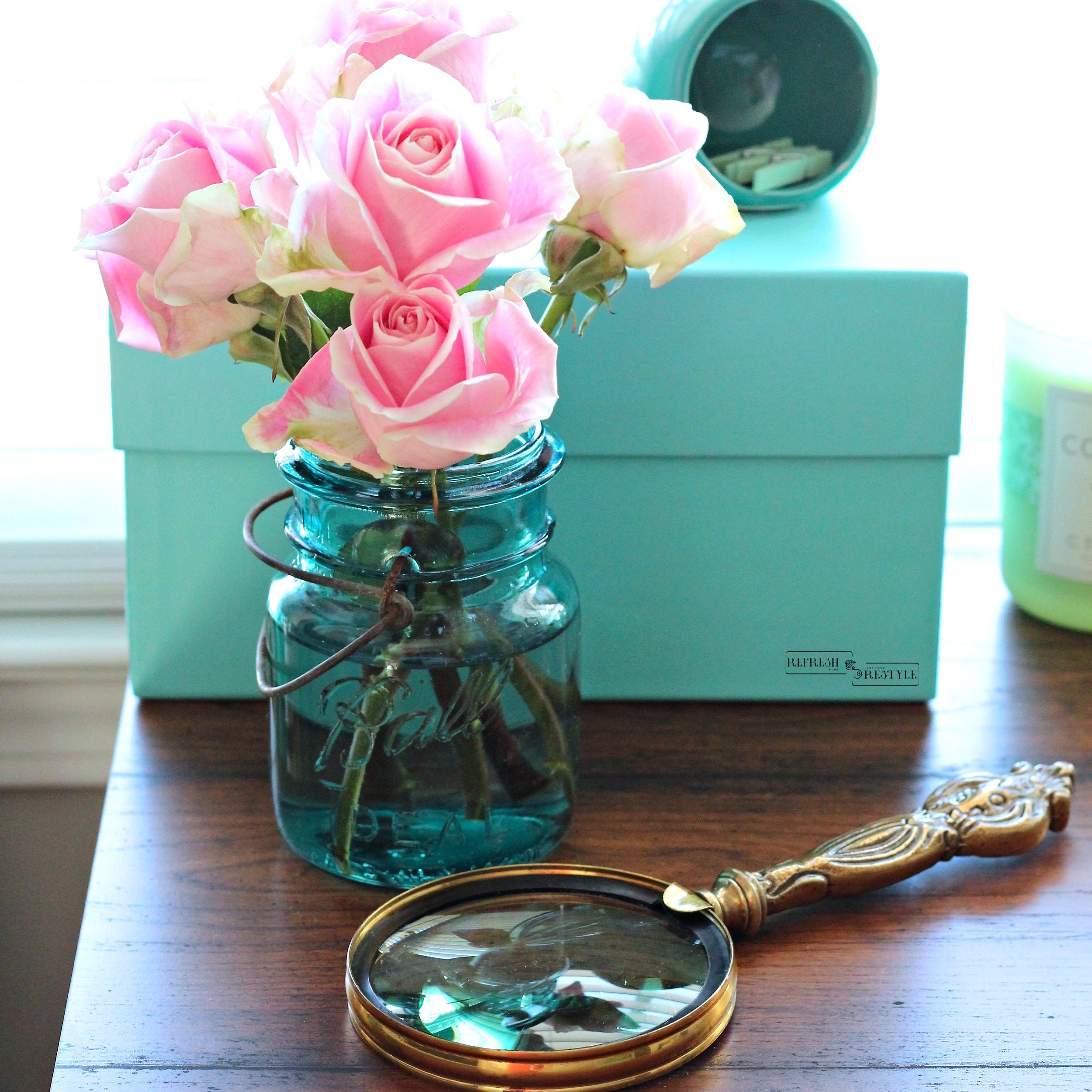 Tiffany blue box, magnifying glass and pink rose. Just a few of my favorite things.
