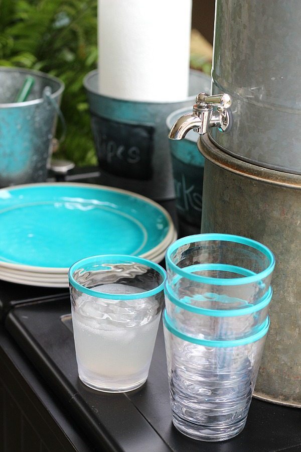 Serving station with aqua and galvanized serving pieces