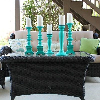 Spray paint large candle holders to create a beautiful aqua statement.