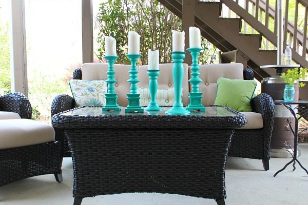 Spray paint large candle holders to create a beautiful aqua statement.