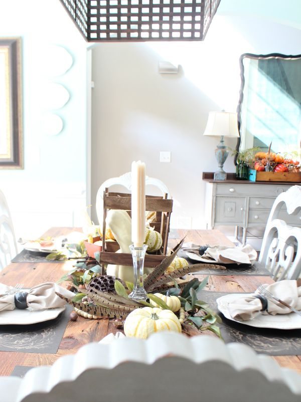 Bright and beautiful fall tablescape with feathers and neutral colors