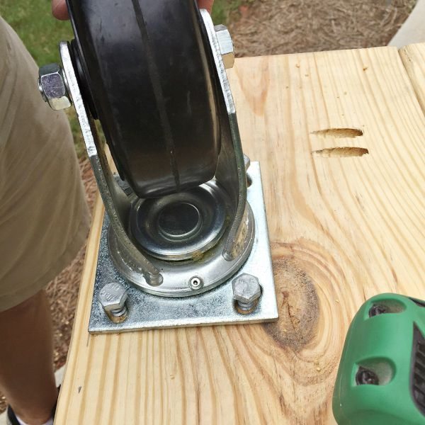 Industrial casters, wheels attached to create and industrial table at RefreshRestyle.com