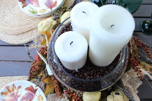 Place candles in coffee beans for a perfectly scented centerpiece at refreshrestyle.com