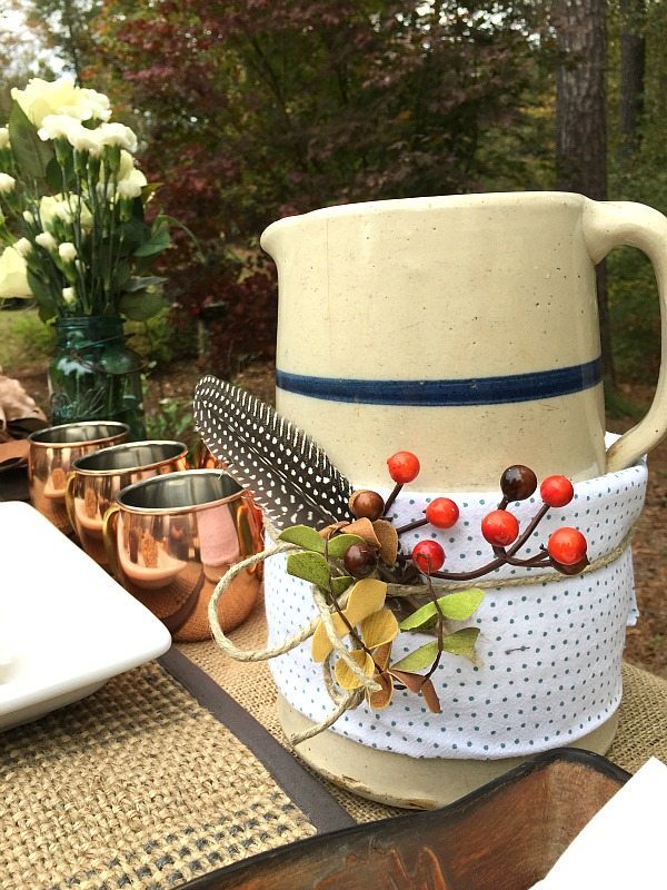 Outdoor Living with Better Homes and Gardens dish towel wrapped around the apple cider pitcher #sp #BHGLiveBetter