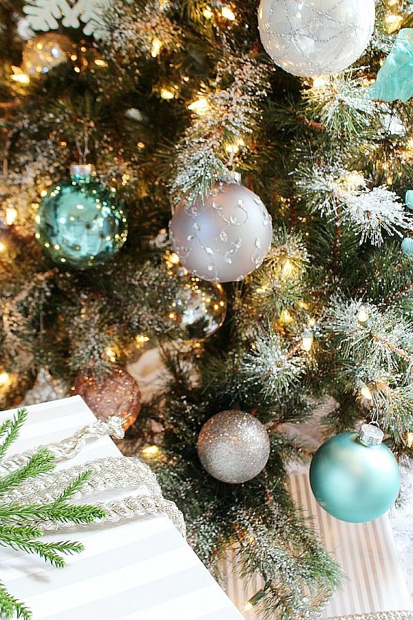 Beautiful ornaments and frosty tips on the Christmas tree