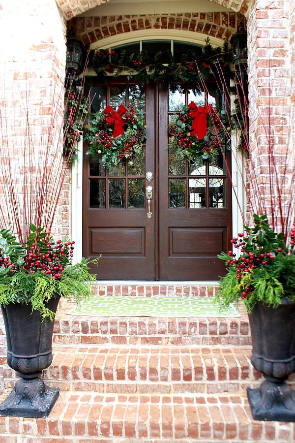 Christmas entry with twin wreaths and urns