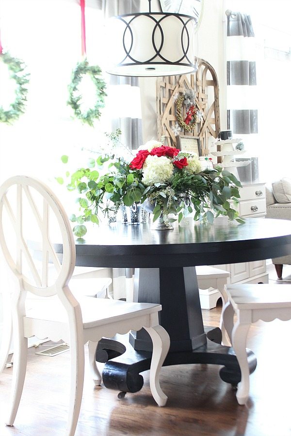 Dining Room Round black table with white chairs