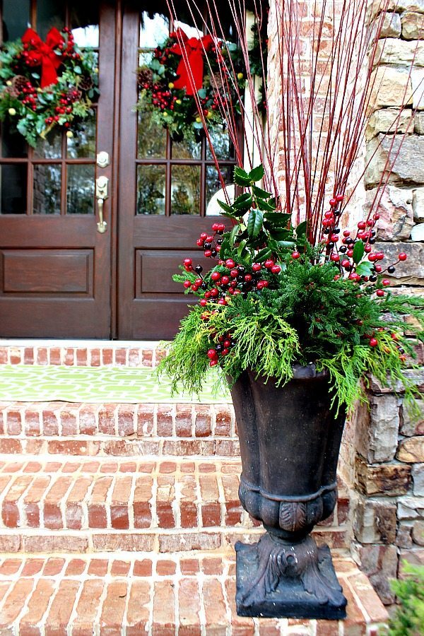 Refreshed urns with stuff from the yard