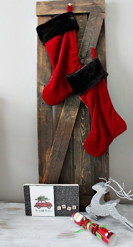 Stocking hung by the bed in the guest room