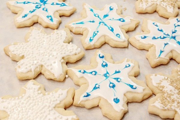 Christmas cookies with pearls, golden sugar and stars