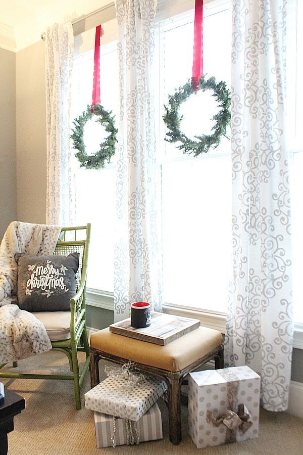 Small wreaths on the bedroom windows