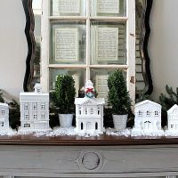Thrifty idea for a White Christmas village using building from Goodwill