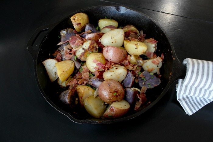 Iron skillet oven roasted potato recipe, filled with flavor and bacon