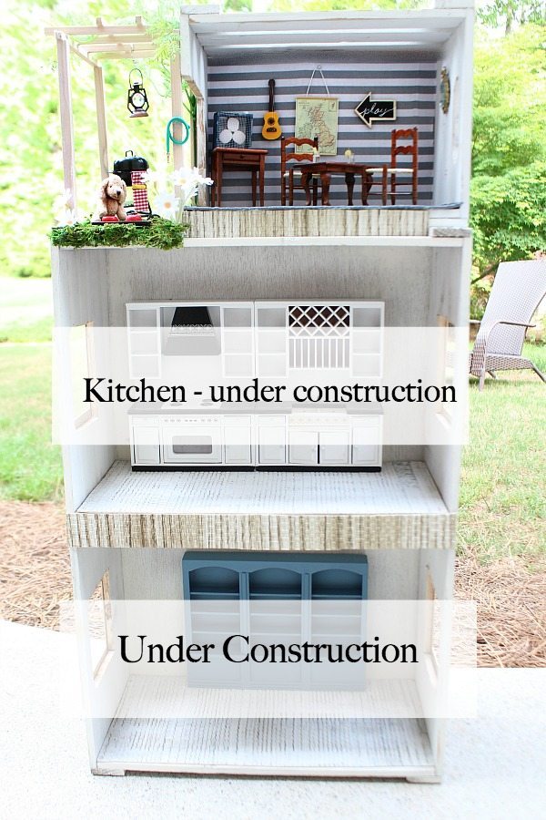 https://refreshrestyle.com/wp-content/uploads/2016/04/One-Room-makeover-in-the-dollhouse-made-from-crates-at-Refresh-Restyle.jpg