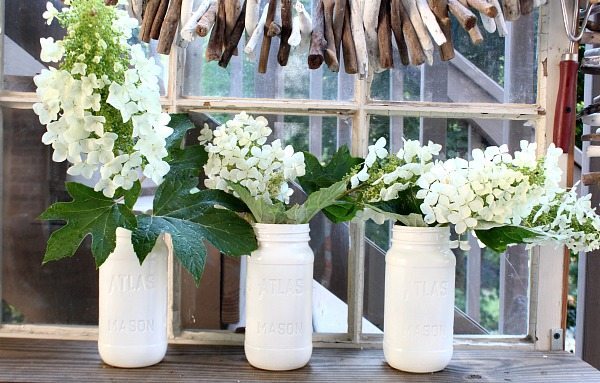 Make your own Milk Glass - use free mason jars and Valspar Milk Glass Paint details at RefreshRestyle.com