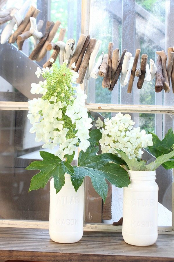 Make your own Milk Glass - use free mason jars and Valspar Milk Glass Paint details at RefreshRestyle.com