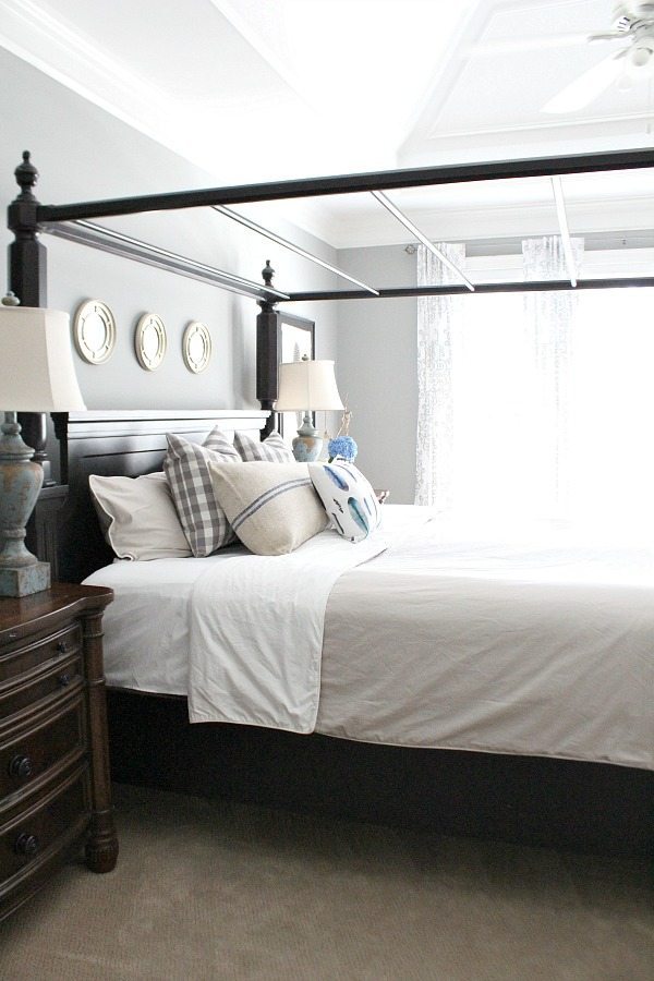 Master bedroom with grays light and bright space at RefreshRestyle.com