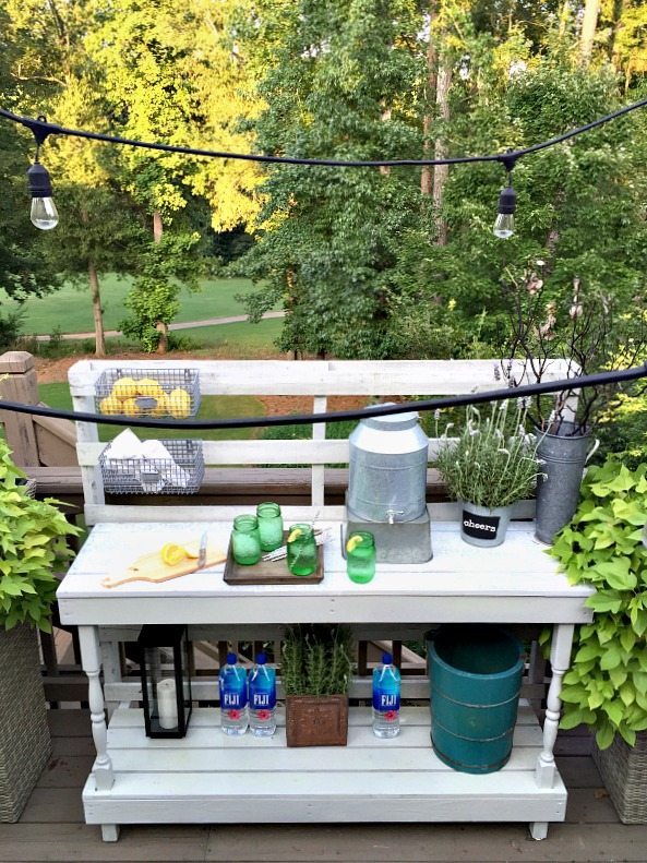 Made from a pallet - outdoor potting table serves as buffet or drink service area