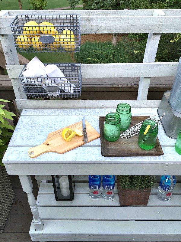 Stenciled and painted - Dining -Rustic farmhouse serving area idea - Made from a pallet - outdoor potting table serves as buffet or drink service area