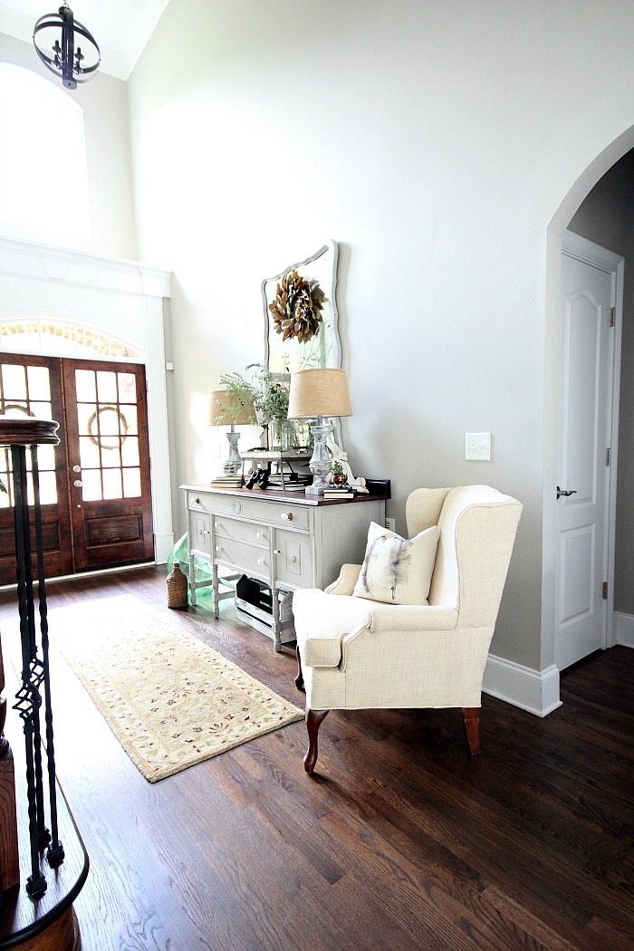 Painted lamp bases mirror and side board - love the light bright entry