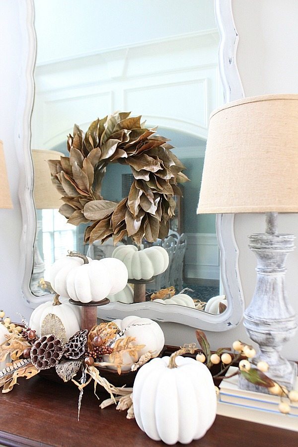 White pumpkins dried hydrangea and feathers for a bright fall idea at Refresh Restyle