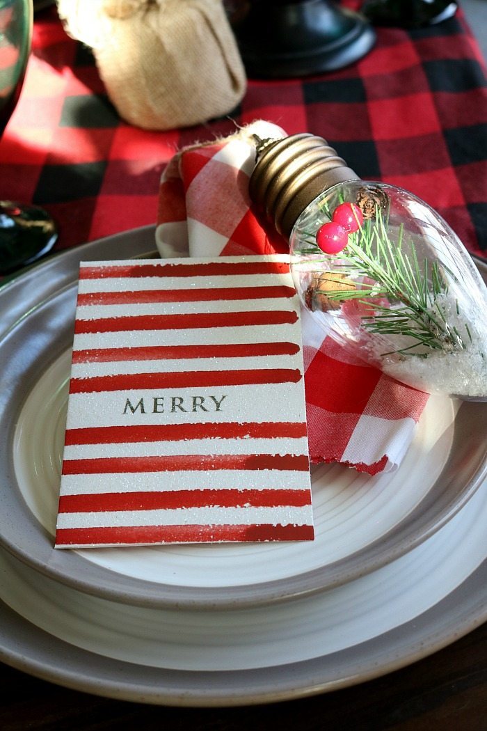 Use a small Christmas card for the place cards