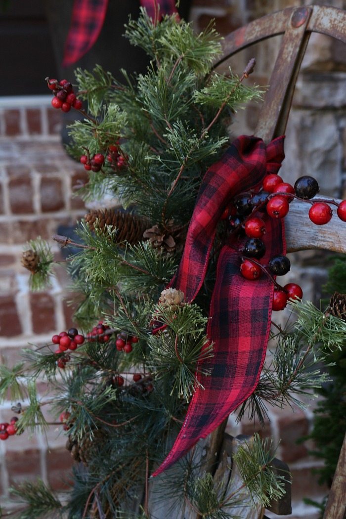 plaid-and-greenery-dress-up-an-old-sled-for-rustic-farmhouse-front-porch