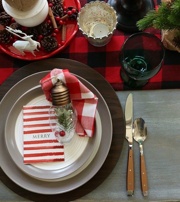 Woodland ornament used as a napkin ring for the farmhouse table at Christmas