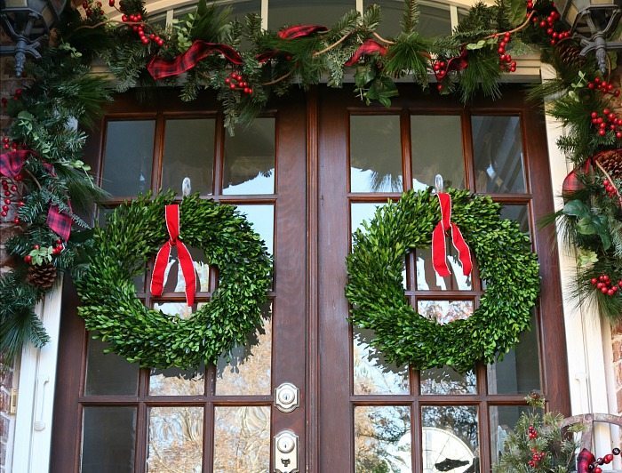 beautiful-preserved-boxwood-wreaths-with-simple-red-ribbons