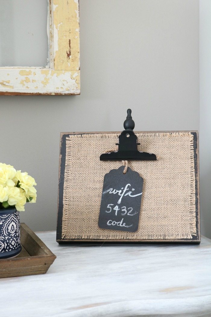 Cute idea - add the wifi code on a chalkboard tag and put it on a burlap photo frame