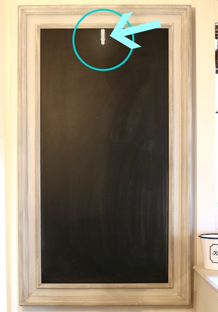 Add a command hook on your chalkboard to hang seasonal decor