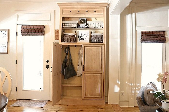 Cabinet repurposed into a mudroom closet