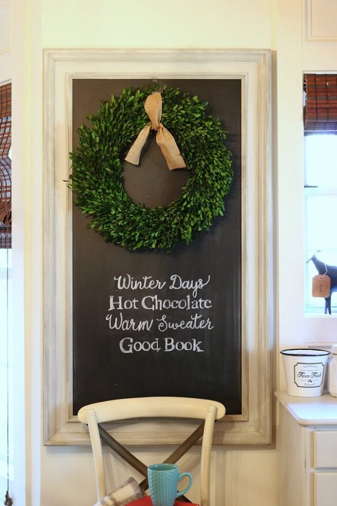 Chalkboard with winter quote plus that boxwood wreath