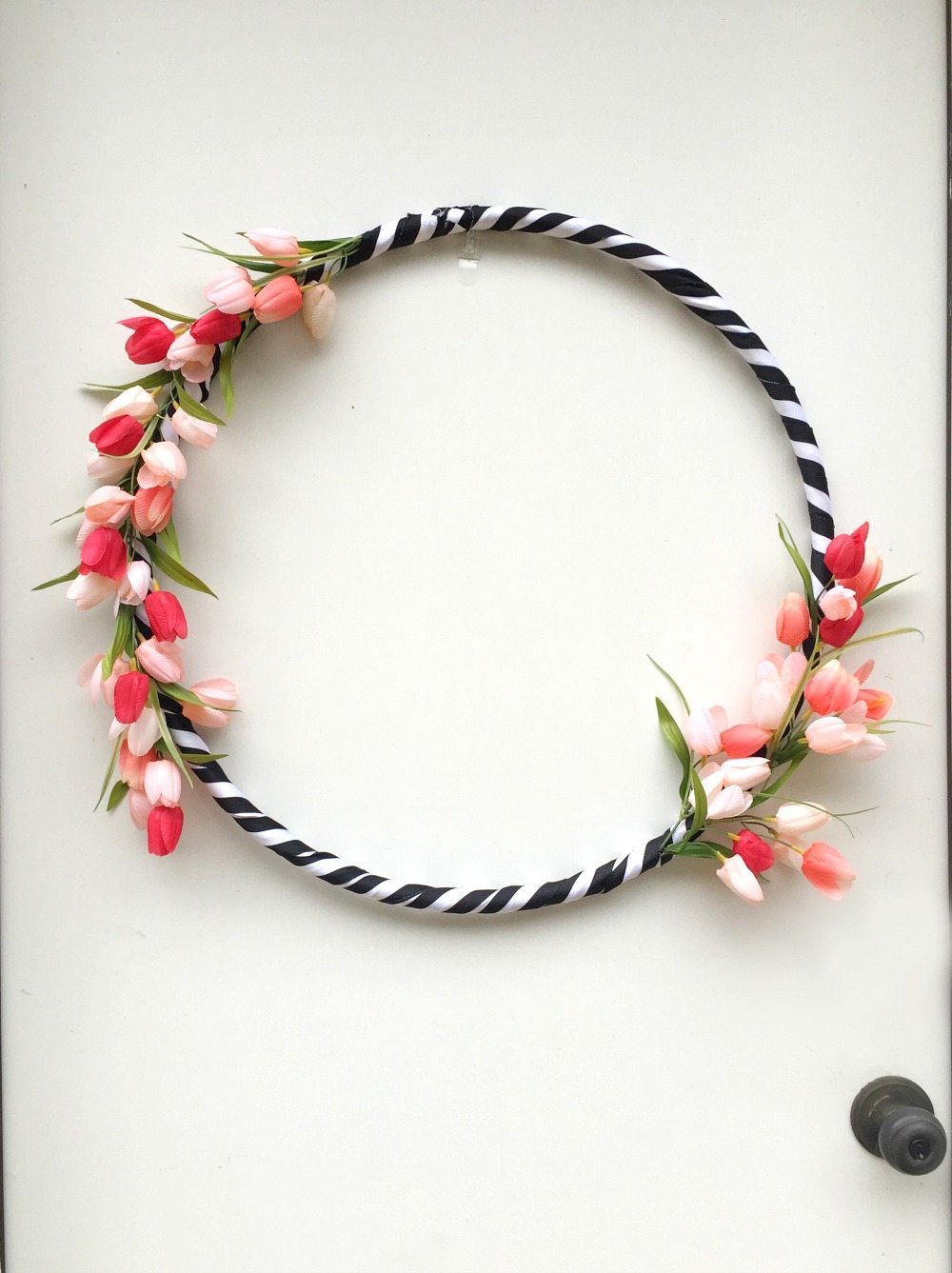 Hula Hoop spring wreath with black and white ribbon