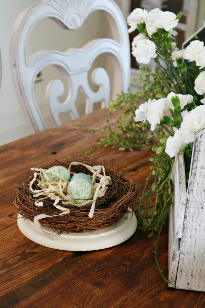 Nests with speckled eggs are great for spring tablescapes at Refresh Restyle