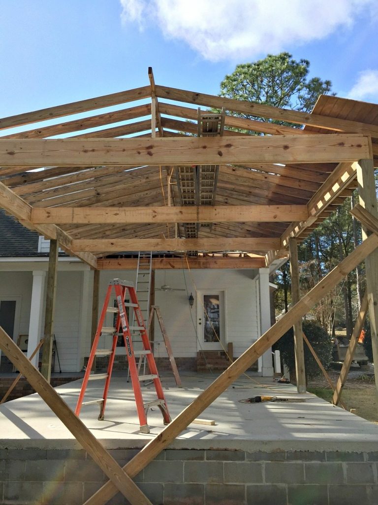 Rafters going up for the roof at Refresh Restyle patio into porch refresh