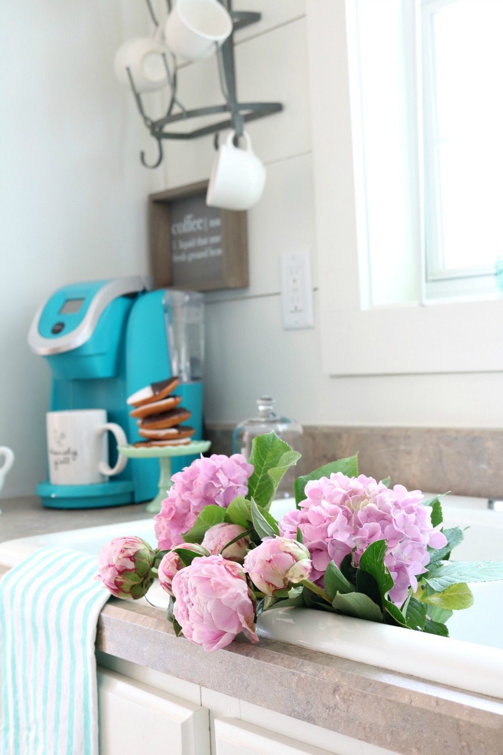 Summer blooms of hydrangeas and peonies add a fresh look to any space