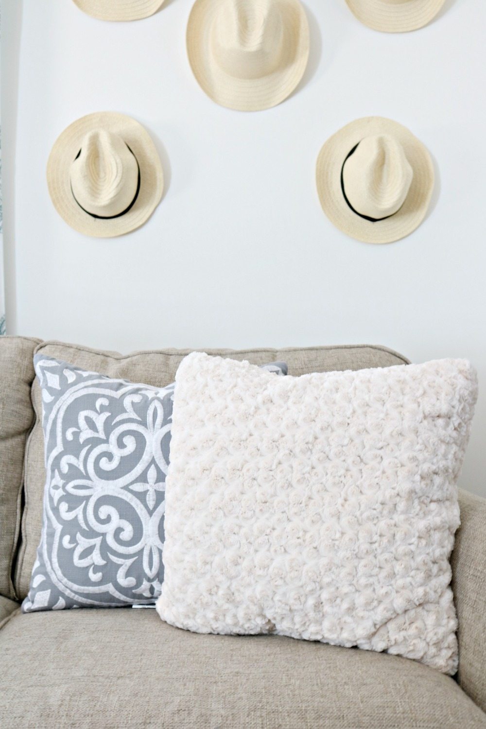 Mix of pillows add texture and color to any space