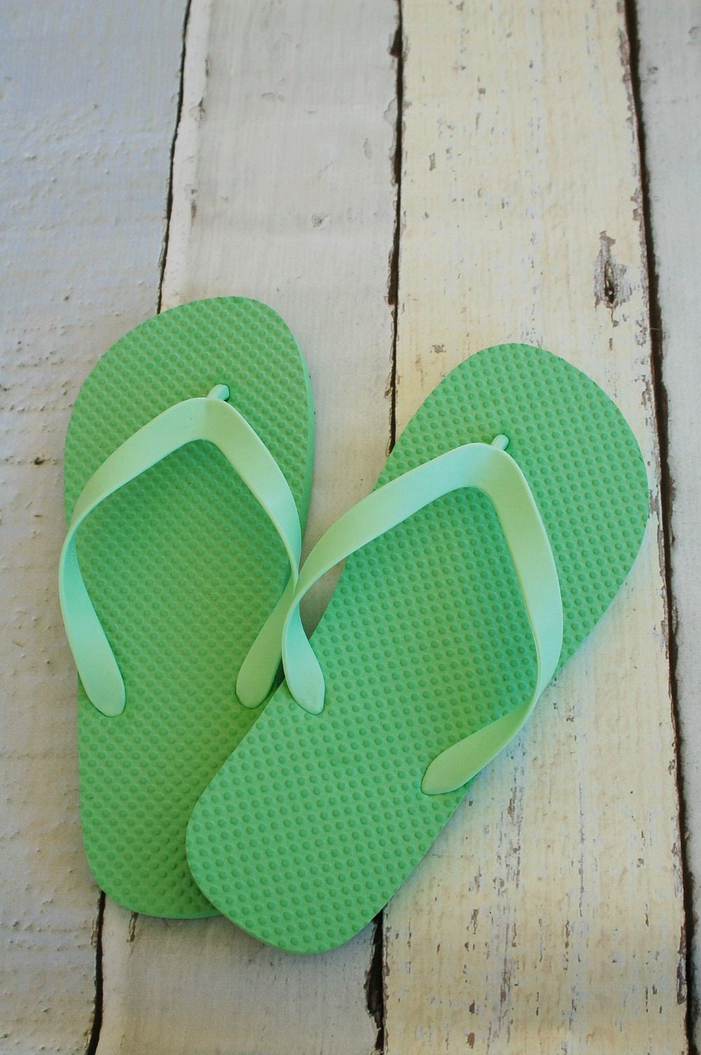 Plain flip flops can be transformed with iron on vinyl