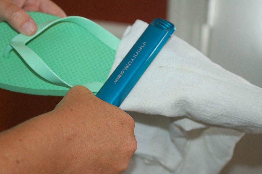 Using a flat iron for heat transfer vinyl on to flip flops