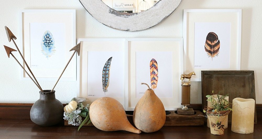 Feather prints in white frames for fall