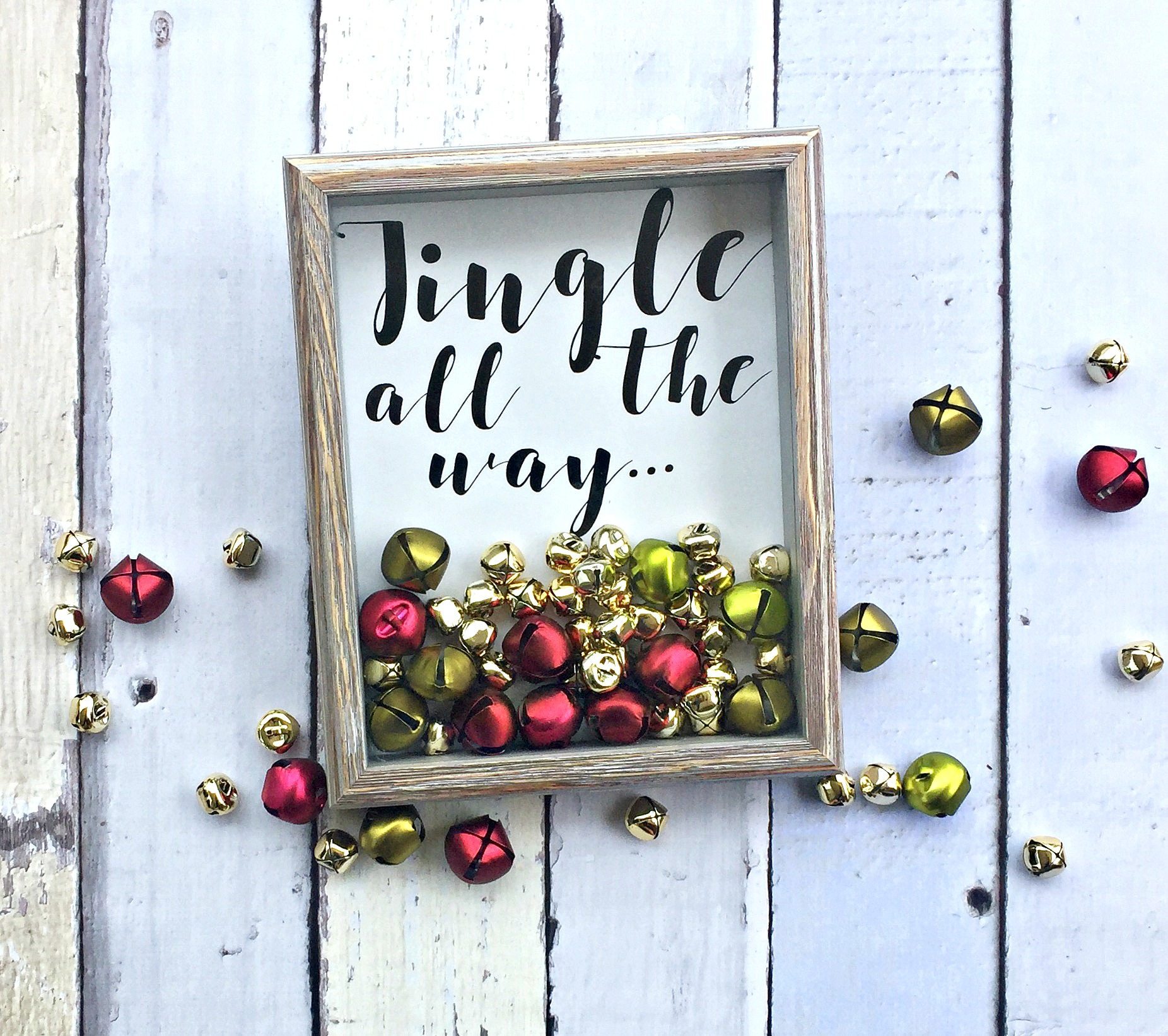Make this Christmas Jingle all the way shadow box with your vinyl cutter Cricut