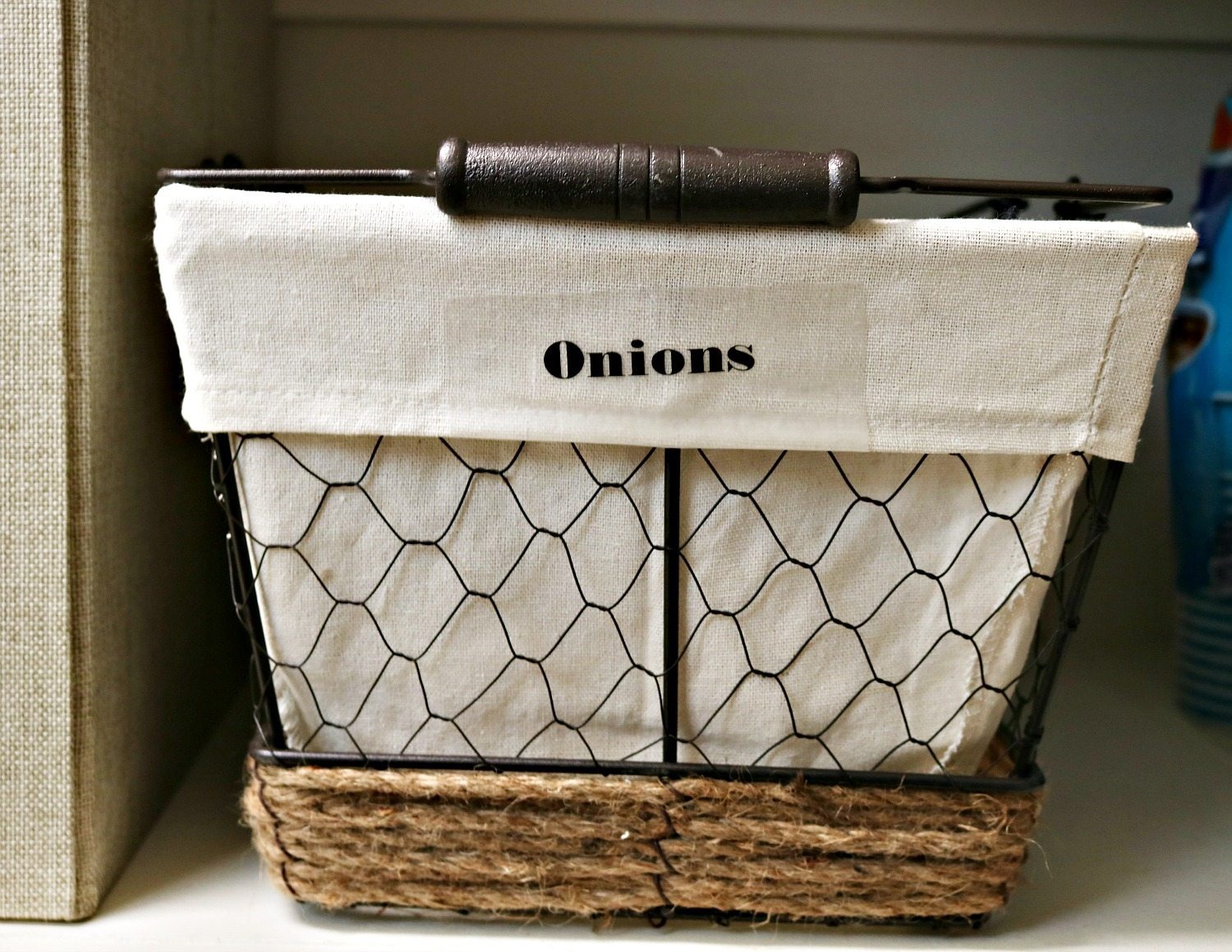 Separate baskets for potatoes and onions in the pantry