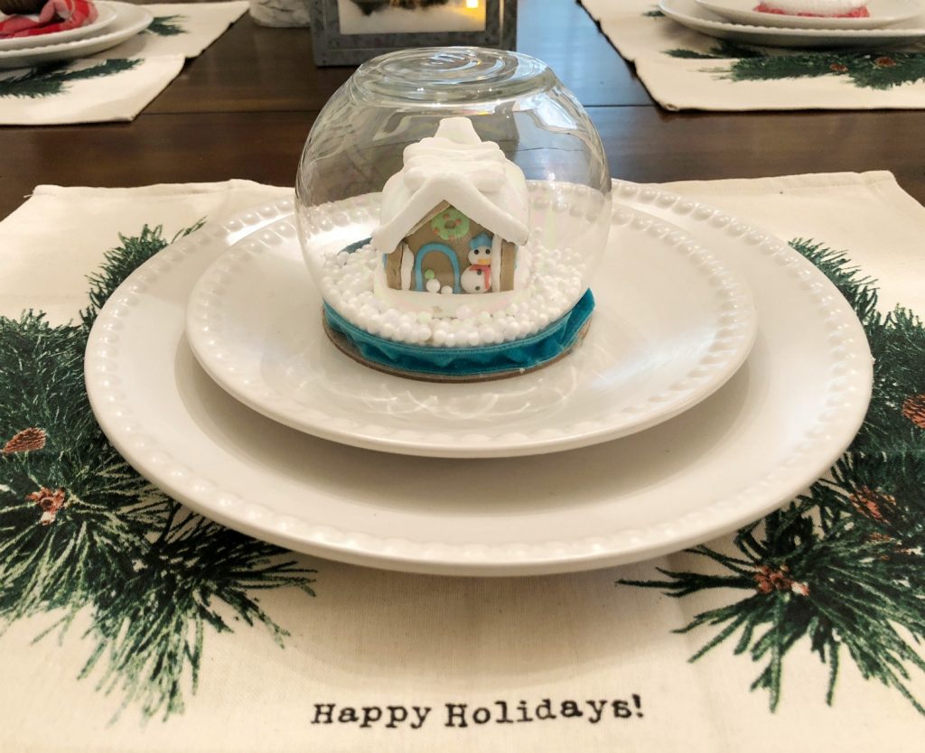 Mini snow globe trimmed in blue velvet