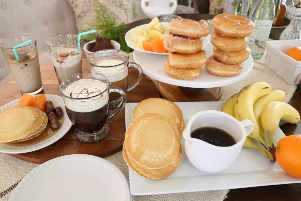 Coffee donuts pancakes and fruit bar