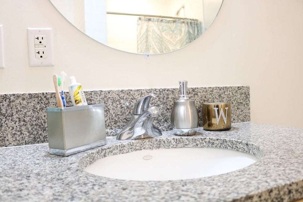 small bath in condo - minimal sink decor